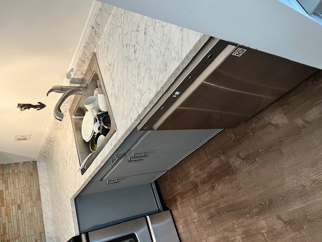 Finished small kitchen remodel with new counters and cabinetry in Bedford