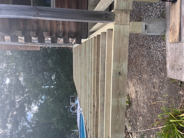 Deck joist layout during a Goffstown deck rebuild