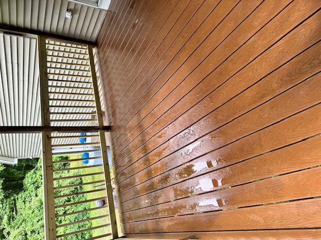 Trex deck rebuild with wooden railing in Goffstown